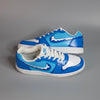 hand-painted sneaker, design inspired from blue water on a gray background