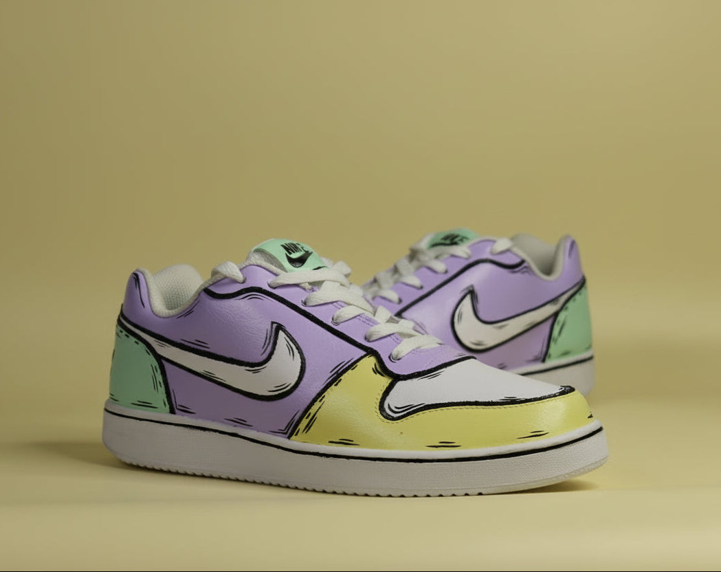 hand-painted Pair of sneakers with a multi color (yellow, green and purple) with cartoonish design on a yellow background