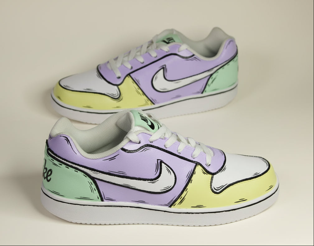 Hand-painted sneakers with a multi color (yellow, green and purple) with sketch outline 
design on a off-white background