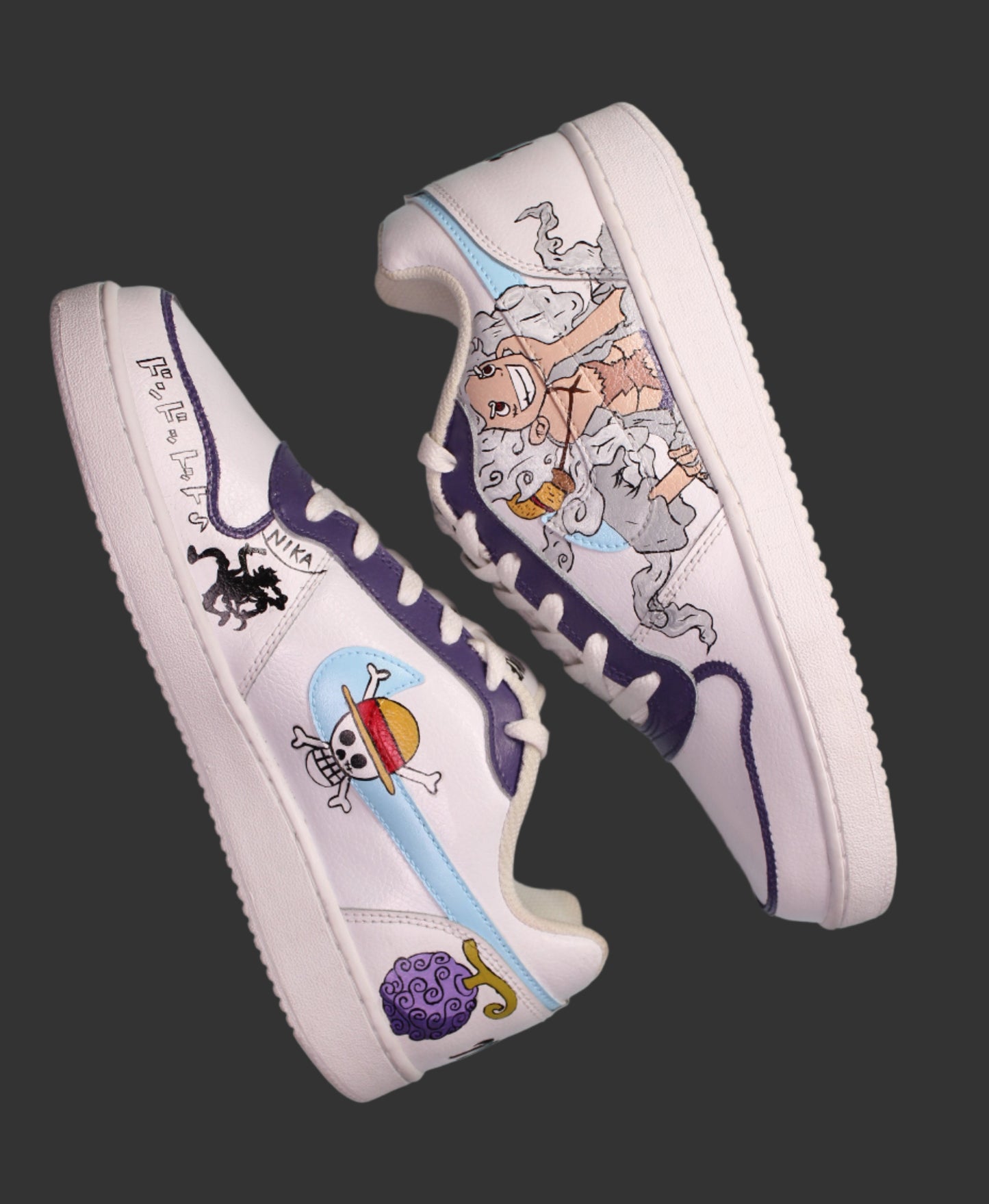 Pair of white sneakers with a unique anime-inspired design from One Piece, called Luffy, on a black background