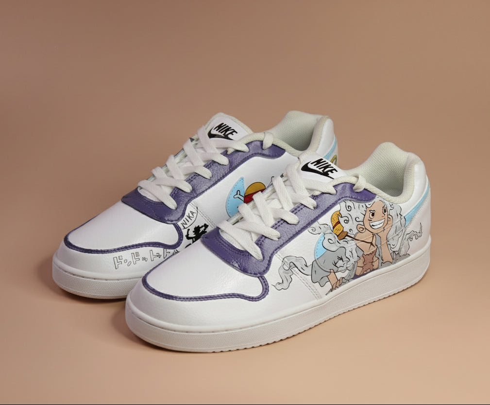 White sneakers with purple accents and Monkey D Luffy inspired designs on a light rusty background