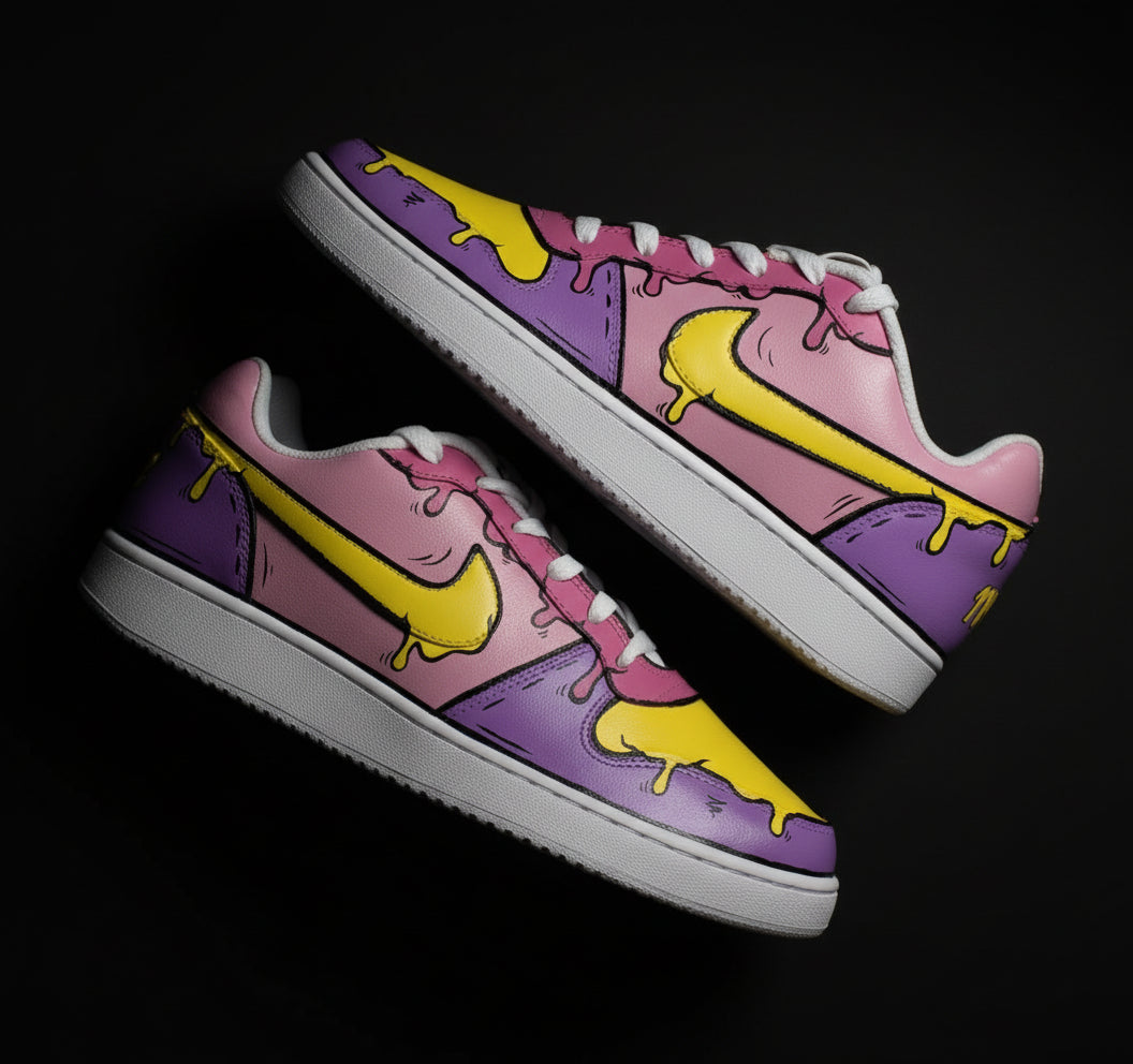Hand-painted colourful (pink, purple and yellow) Nike sneakers with cartoonish and melted effect design on a black  background