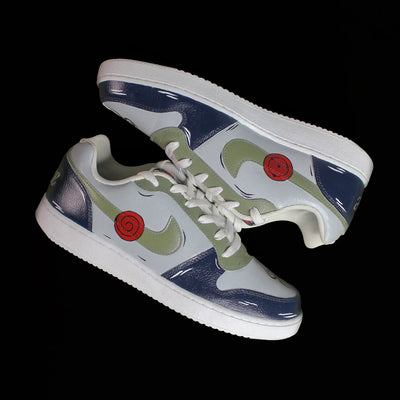 A hand-painted pair of Nike sneakers with a design inspired by Kakashi of the Naruto manga, on a black background. 